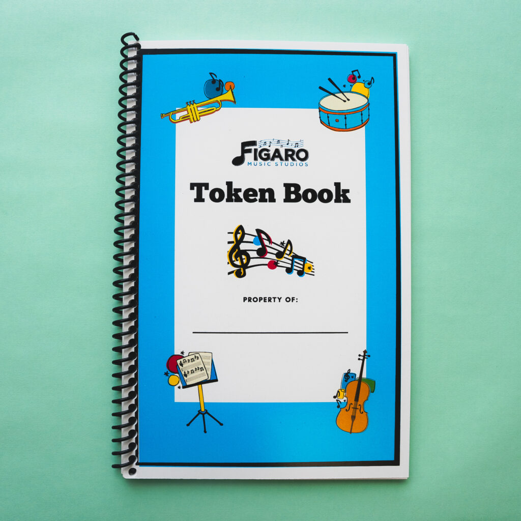 Spiral-bound program booklet printed by Capitol Copy