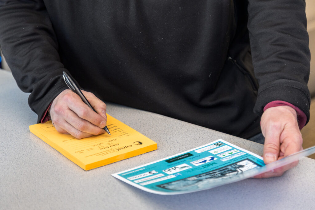 Reviewing a printed proof with the customer